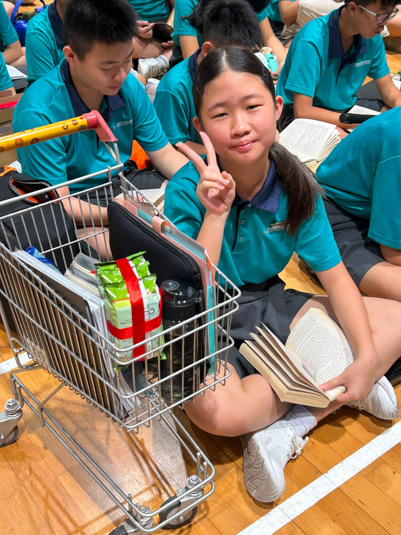 girl with a mini supermarket trolley
